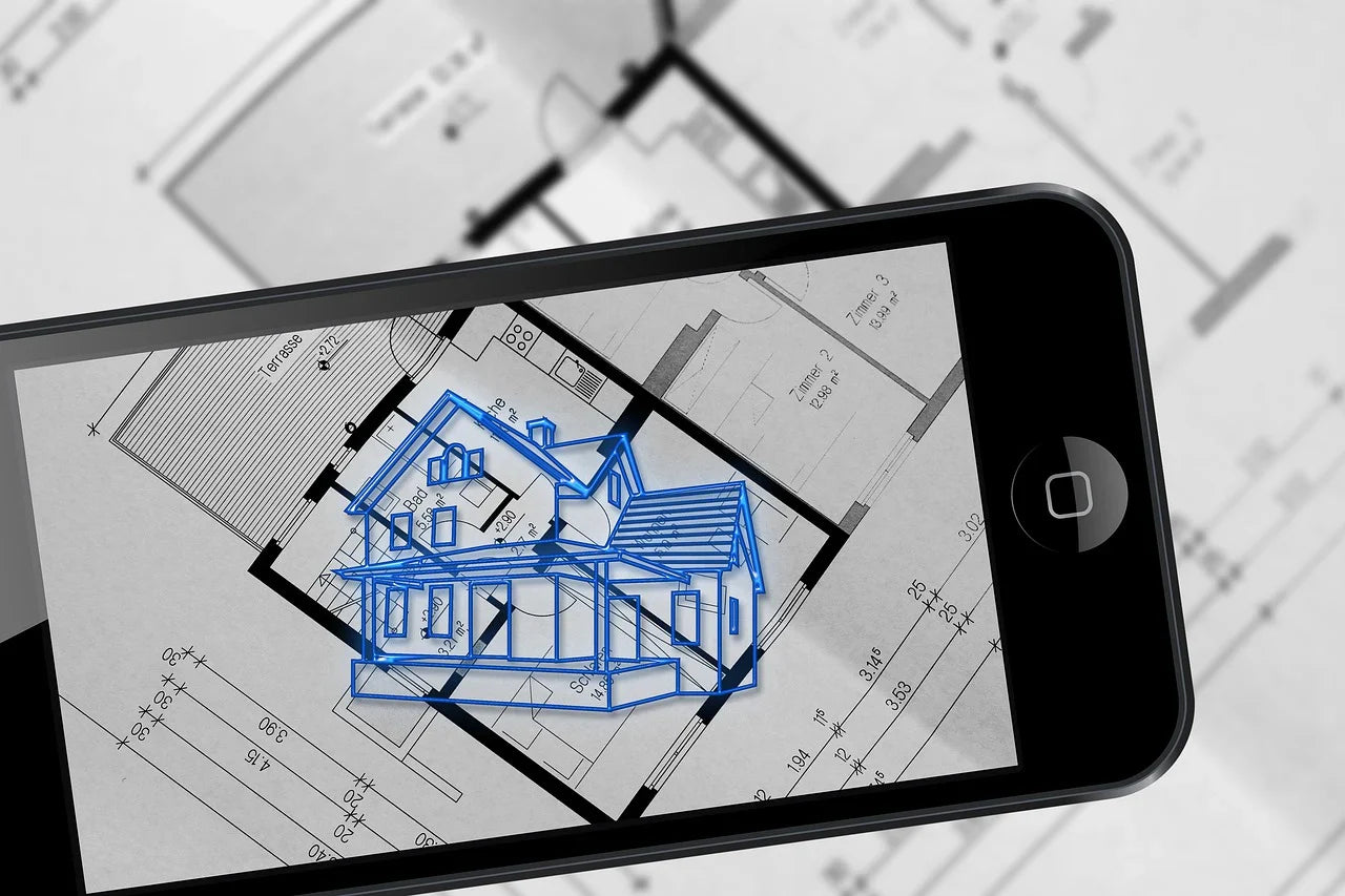 house design concept image - blueprints viewed through smartphone with rendering